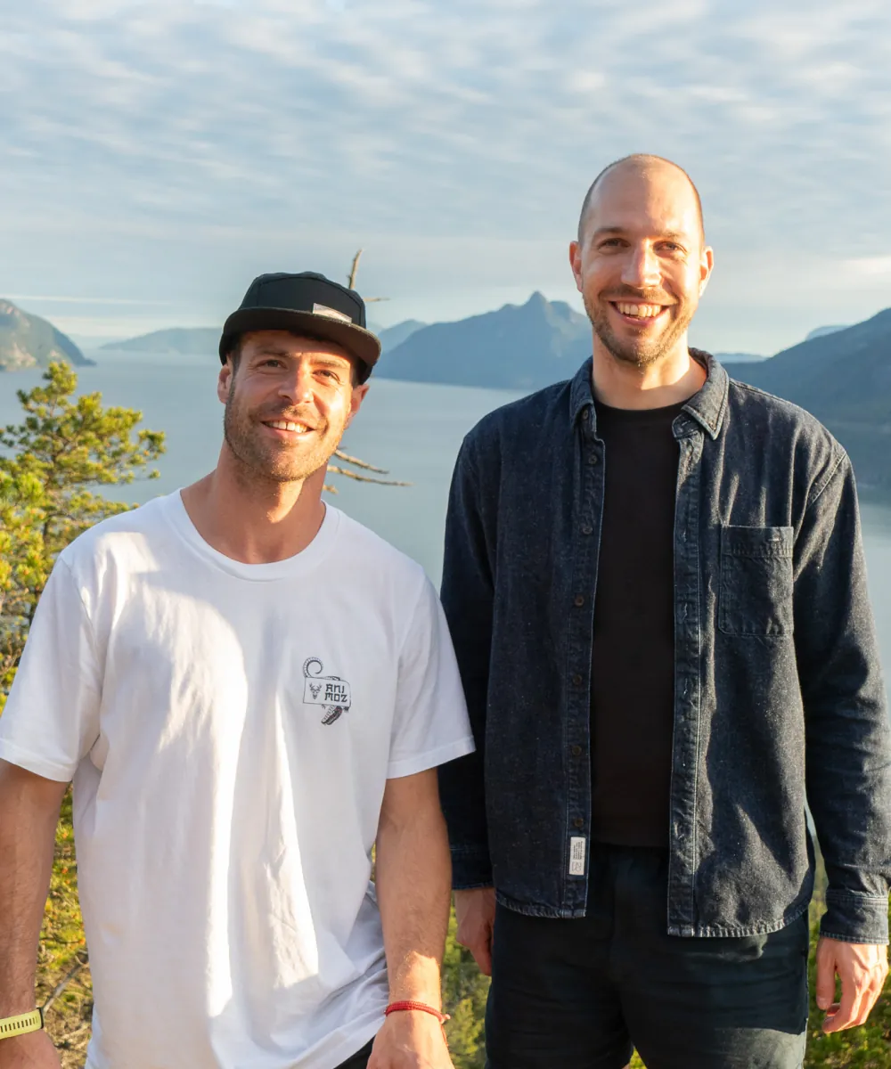 Nik and Rai smiling above the Howe Sound
