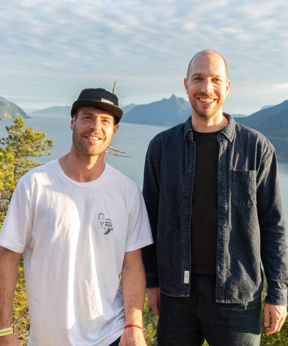 Nik and Rai smiling above the Howe Sound